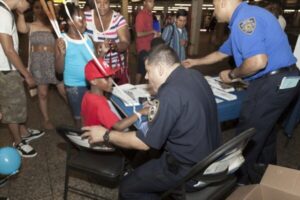 police officer talking with kids