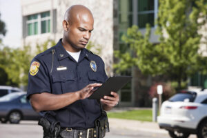 police officer on ipad