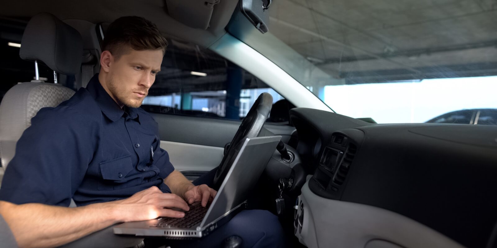 police officer on computer